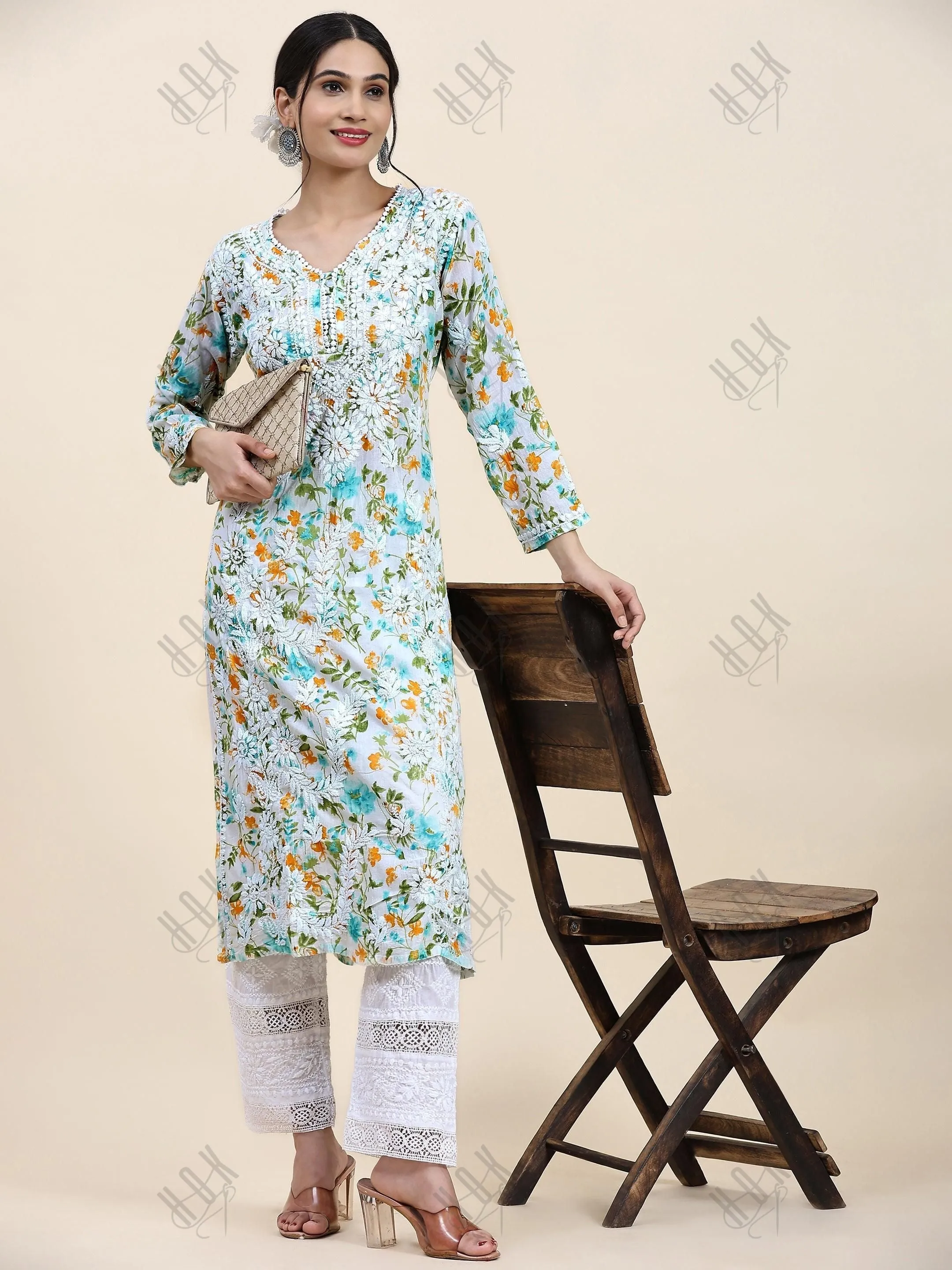 Sukruti in Charming Long Mul Cotton Kurta - Light Green with Yellow Flower